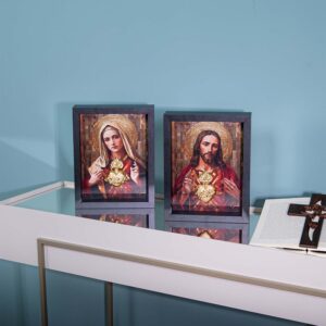 Detalhe das folhas de ouro no coração divino